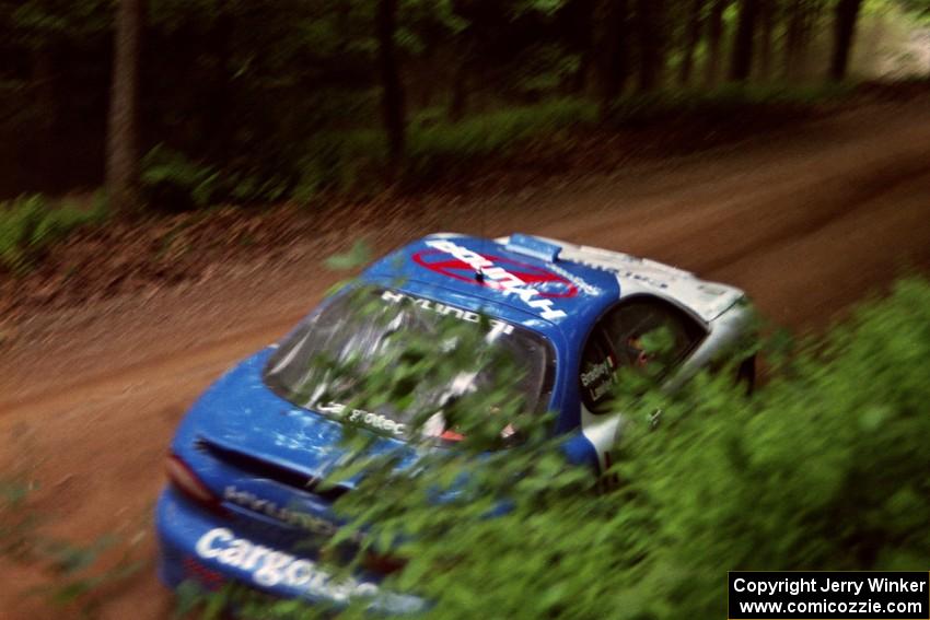 Noel Lawler / Charles Bradley Hyundai Tiburon powers out of a hairpin on SS5, Thompson Point I.