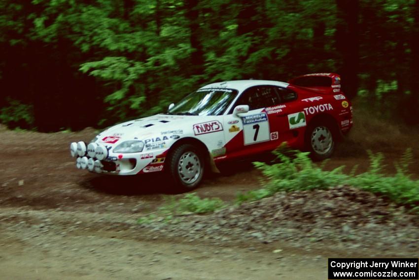 Ralph Kosmides / Joe Noyes Toyota Supra Turbo slides into a hairpin on SS5, Thompson Point I.
