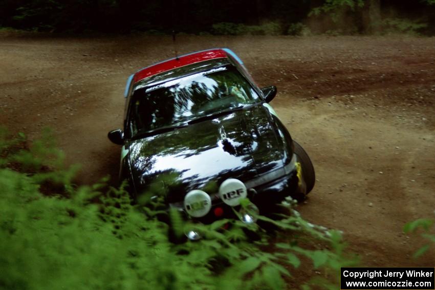 Cal Landau / Eric Marcus Mitsubishi Eclipse GSX powers out of a hairpin on SS5, Thompson Point I.