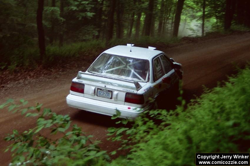 Keith Townsend / Jennifer Cote Toyota Corolla powers out of a hairpin on SS5, Thompson Point I.