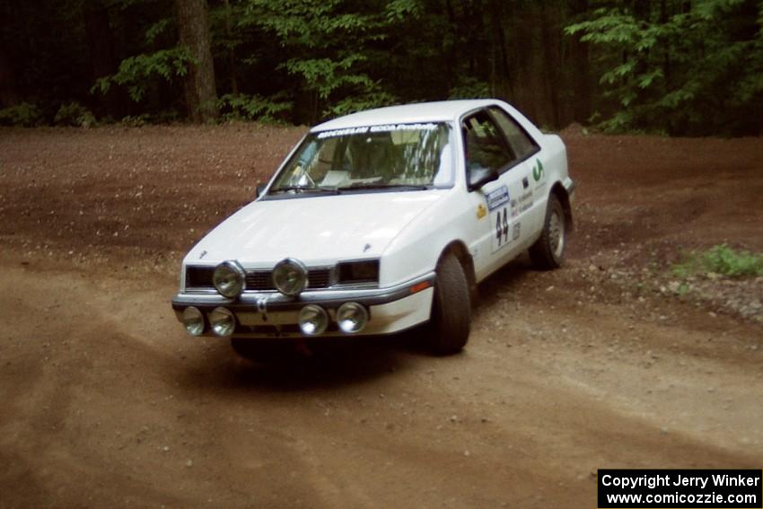 Henry Krolikowski / Cindy Krolikowski Dodge Shadow powers out of a hairpin on SS5, Thompson Point I.