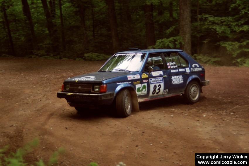 Mark Utecht / Diane Sargent Dodge Omni GLH-Turbo at a hairpin on SS5, Thompson Point I.