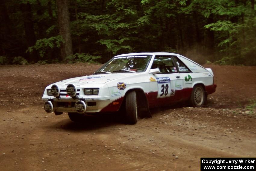 Lesley Suddard / Marc Goldfarb  Dodge Shelby Charger at a hairpin on SS5, Thompson Point I.