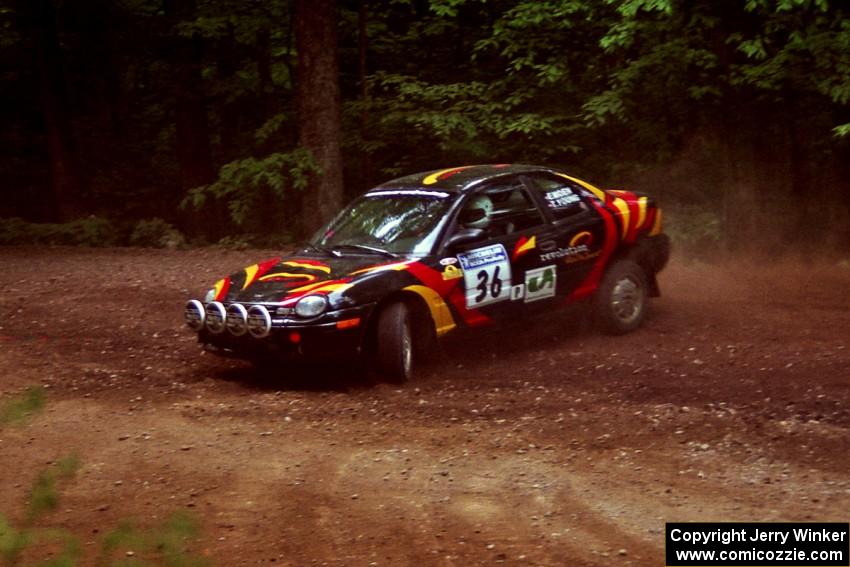 Evan Moen / Tom Young  Plymouth Neon ACR at a hairpin on SS5, Thompson Point I.