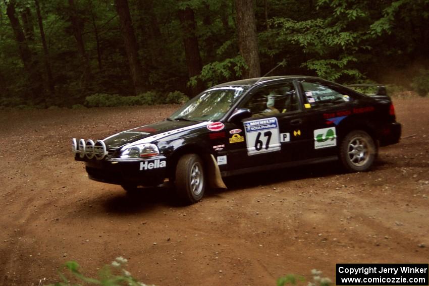 Jay Kowalik / Scott Embree Honda Civic CVT at a hairpin on SS5, Thompson Point I.