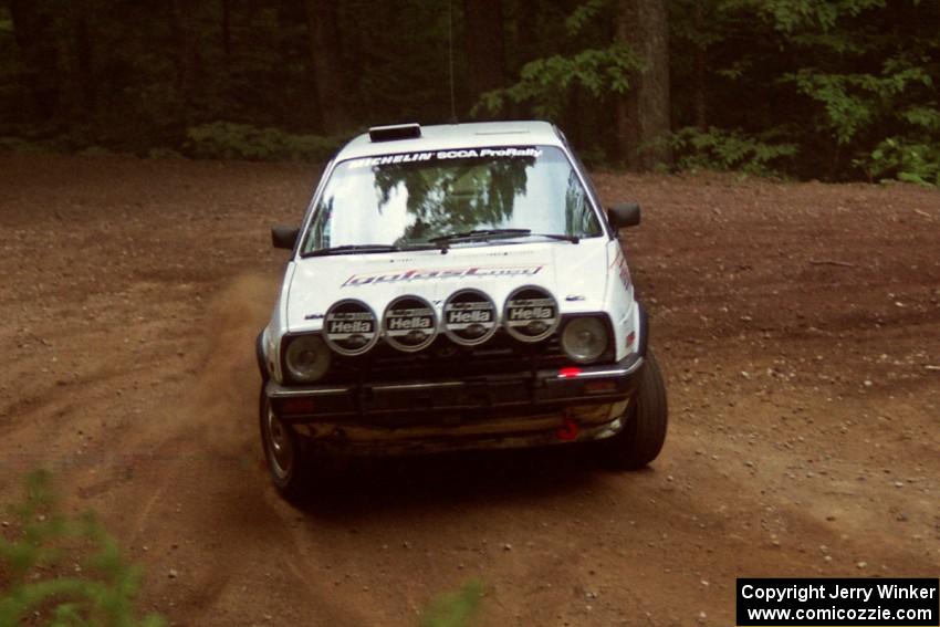 Doug Davenport / Al Kintigh VW GTI powers out of a hairpin on SS5, Thompson Point I.