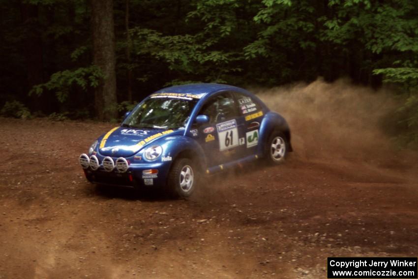 Karl Scheible / Gail McGuire VW Beetle slides into a hairpin on SS5, Thompson Point I.