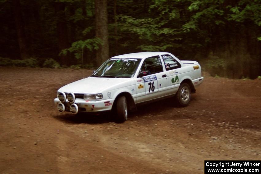 Ted Mendham / Lise Mendham Nissan Sentra SE-R slides into a hairpin on SS5, Thompson Point I.