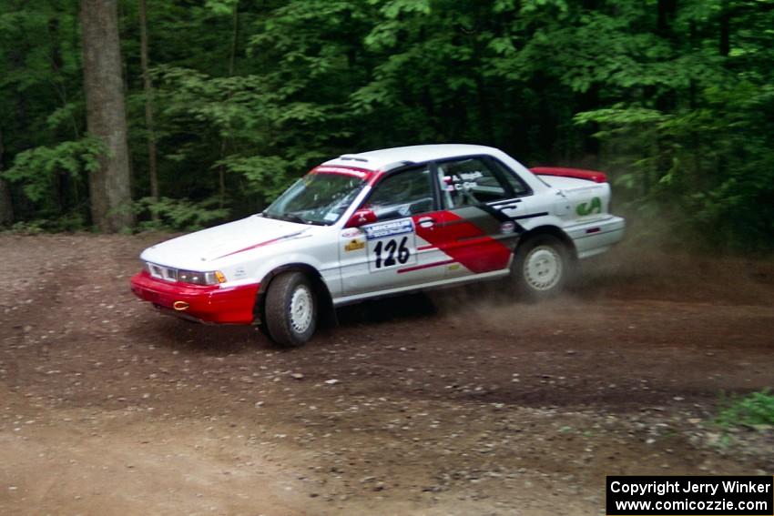 Arthur Wojcik / Chuck Cox Mitsubishi Galant VR-4 powers out of a hairpin on SS5, Thompson Point I.