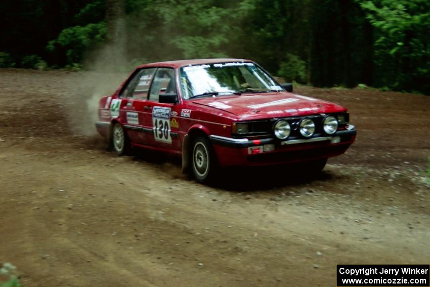 Jim Kuhn / Jennifer Logel Audi 4000 Quattro powers out of a hairpin on SS5, Thompson Point I.