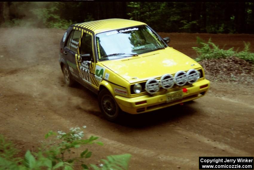 Konstantin Roumiantsev / Elena Roumiantsev VW GTI powers out of a hairpin on SS5, Thompson Point I.