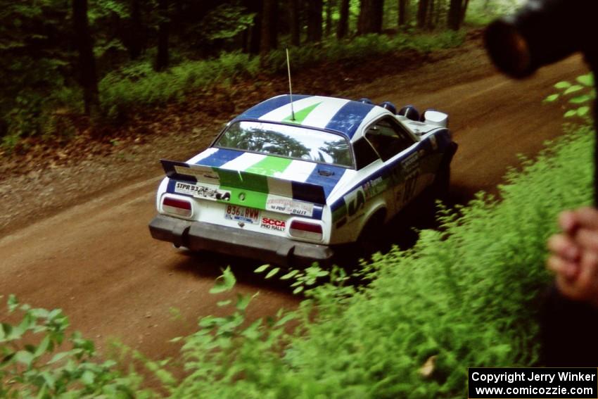 John Shirley / Phil Barnes Triumph TR-7 powers out of a hairpin on SS5, Thompson Point I.