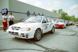 Dean Panton / Michael Fennell Hyundai Elantra and Garen Shrader / Doc Schrader Mitsubishi Lancer Evo IV at the ceremonial start.