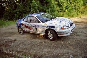 Noel Lawler / Charles Bradley Hyundai Tiburon at a hairpin on SS3, Grafton I.