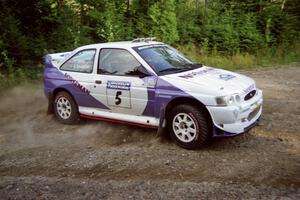 Stig Blomqvist / Lance Smith Ford Escort Cosworth RS at a hairpin on SS3, Grafton I.