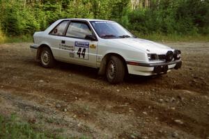 Henry Krolikowski / Cindy Krolikowski Dodge Shadow at a hairpin on SS3, Grafton I.