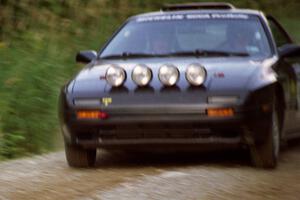 Jens Larsen / Roger Sanderson Mazda RX-7 at speed on SS3, Grafton I.