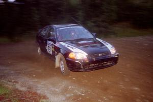 Nick Robinson / Carl Lindquist Honda Civic at a hairpin on SS4, Grafton II.