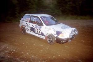 Ilana Rosenshein / Jennifer Cote Suzuki Swift GTi at a hairpin on SS4, Grafton II.