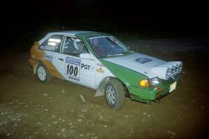 Donal Mulleady / John Reilly Mazda 323GTX at a hairpin on SS4, Grafton II.