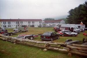 The parking area behind the rally headquarters. The Chris Sanborn / Lou Datilio III Audi 4000 Quattro is on the right.