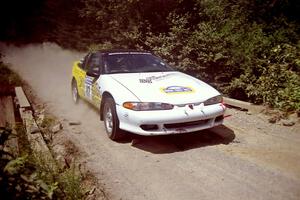 Paul Dubinsky / Yvon Dubinsky Eagle Talon at speed over a bridge on SS5, Magalloway North.