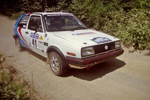 Art Burmeister / Jimmy Brandt VW GTI at speed over a bridge on SS5, Magalloway North.