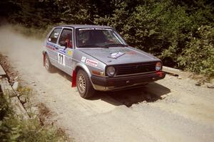 Robert Pao / Bob Barrall  VW GTI at speed over a bridge on SS5, Magalloway North.