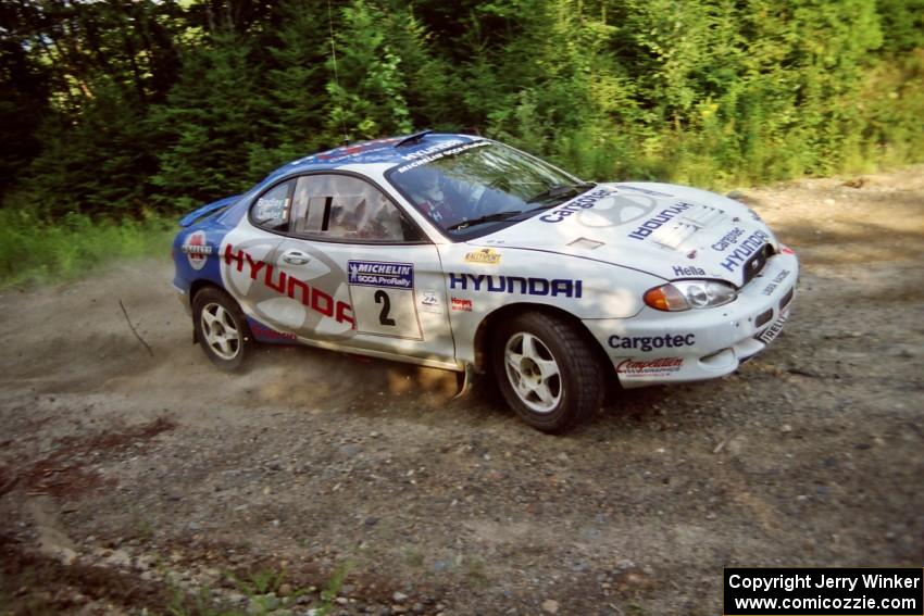 Noel Lawler / Charles Bradley Hyundai Tiburon at a hairpin on SS3, Grafton I.