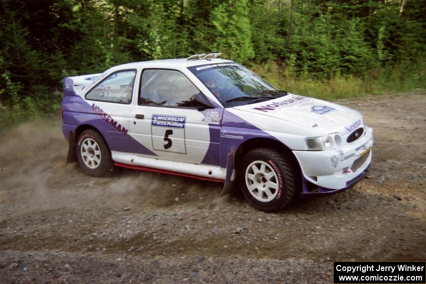 Stig Blomqvist / Lance Smith Ford Escort Cosworth RS at a hairpin on SS3, Grafton I.