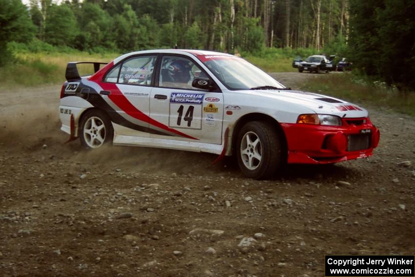 Garen Shrader / Doc Schrader Mitsubishi Lancer Evo IV at a hairpin on SS3, Grafton I.