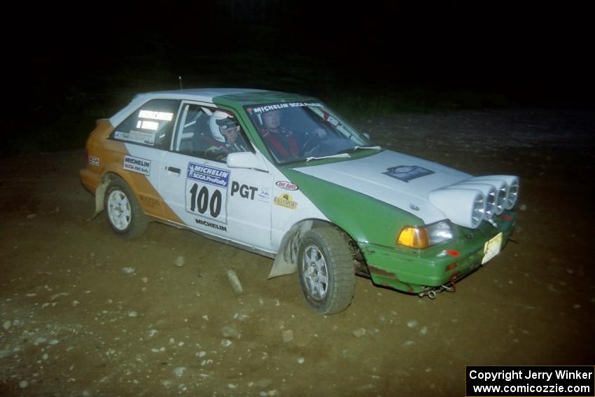 Donal Mulleady / John Reilly Mazda 323GTX at a hairpin on SS4, Grafton II.