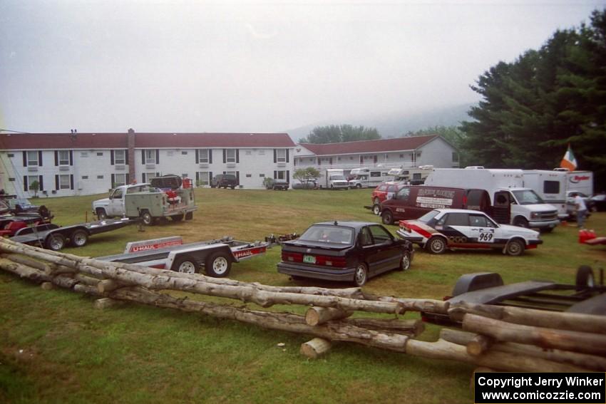 The parking area behind the rally headquarters. The Chris Sanborn / Lou Datilio III Audi 4000 Quattro is on the right.