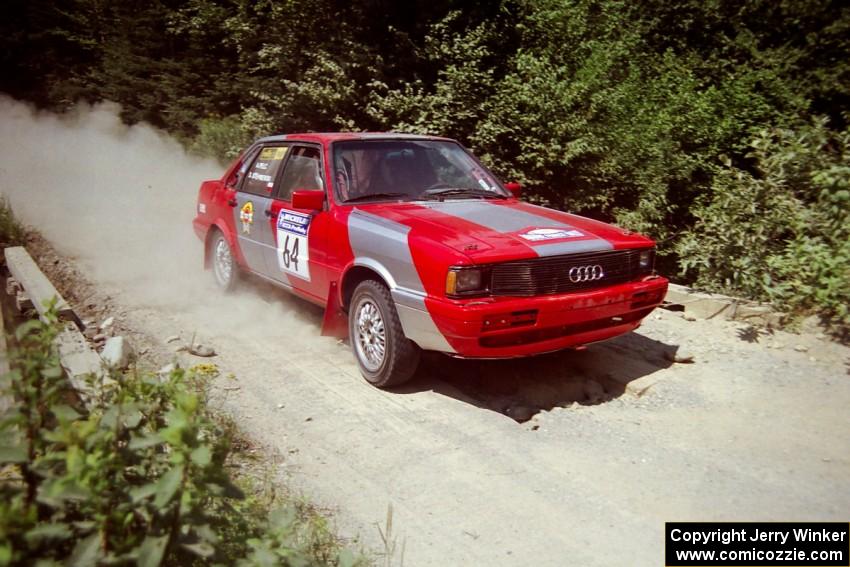 Sylvester Stepniewski / Adam Pelc Audi 4000 Quattro at speed over a bridge on SS5, Magalloway North.