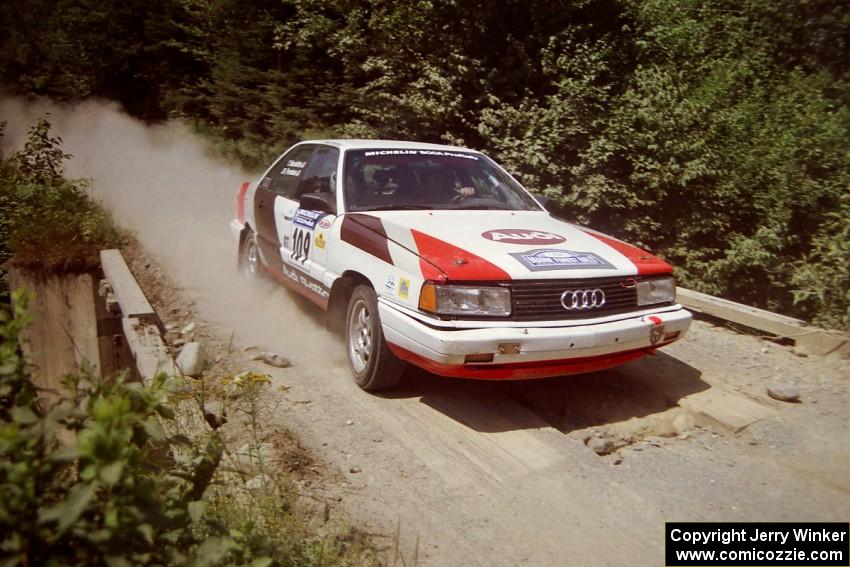 James Frandsen / Todd Bourdette Audi 200 at speed over a bridge on SS5, Magalloway North.