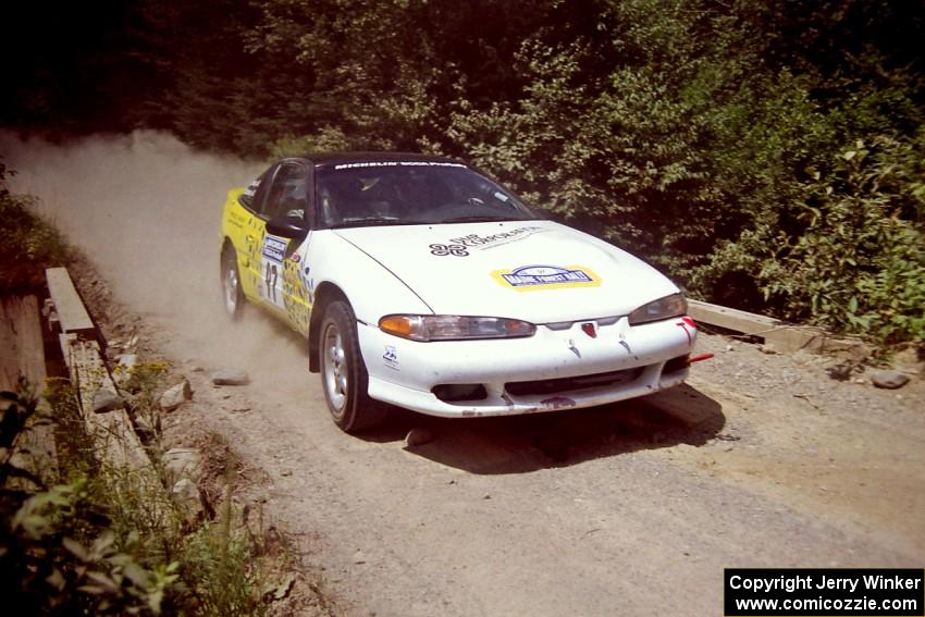 Paul Dubinsky / Yvon Dubinsky Eagle Talon at speed over a bridge on SS5, Magalloway North.