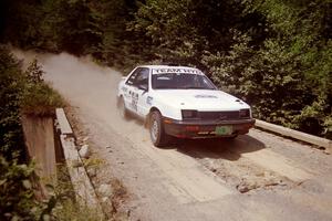 John Carrara / Philip Ho Dodge Shadow at speed over a bridge on SS5, Magalloway North.