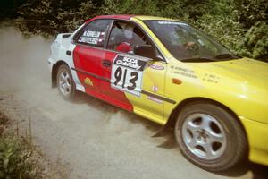 Janusz Jastrzebski / Marcin Korneluk Subaru Impreza at speed over a bridge on SS5, Magalloway North.