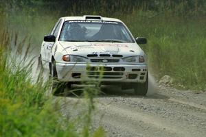 Dean Panton / Michael Fennell Hyundai Elantra at speed on SS8, Parmachenee Long.