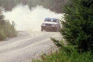 Bill Malik / Christian Edstrom Volvo 240 powers out of a corner on SS8, Parmachenee Long.