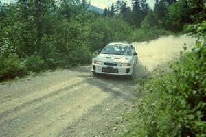 Malachy Crawford / Finian Hannigan Mitsubishi Lancer Evo V at speed on SS8, Parmachenee Long.