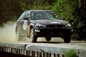 Bryan Hourt / Pete Cardimen Honda Civic hops onto a bridge on SS8, Parmachenee Long.