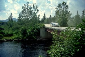 Celsus Donnelly / Kevin Mullan Eagle Talon TSi at speed over a bridge on SS8, Parmachenee Long.