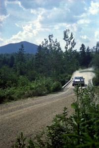 Alex Erisoty / Ben Greisler Audi 90 Quattro at speed over a bridge on SS8, Parmachenee Long.