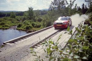 John Rek / Constantine Mantopoulos Audi S2 Quattro at speed over a bridge on SS8, Parmachenee Long.