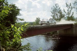 Colin McCleery / Jeff Secor Merkur XR4Ti at speed over a bridge on SS8, Parmachenee Long.