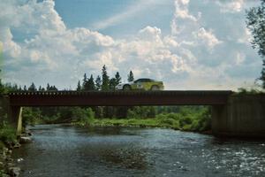 Paul Dubinsky / Yvon Dubinsky Eagle Talon at speed over a bridge on SS8, Parmachenee Long.