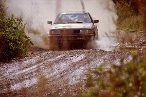 Jerry Cuffe / Barry Cuffe Audi 80 Quattro splashes through a puddle on SS8, Parmachenee Long.