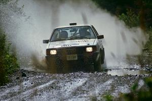 Gerry Brinkman / Will Sekella Audi 4000 Quattro splashes through a puddle on SS8, Parmachenee Long.
