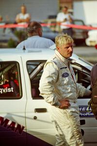 Stig Blomqvist (background) and Lance Smith (foreground) and their Ford Escort Cosworth RS